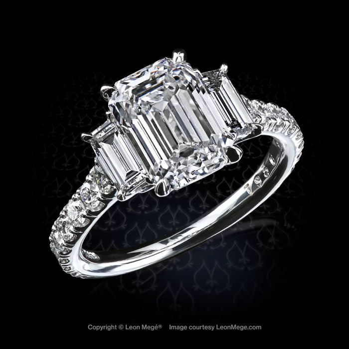 Leon Megé three-stone ring with three matching emerald-cut diamonds and pave on the shank r7936