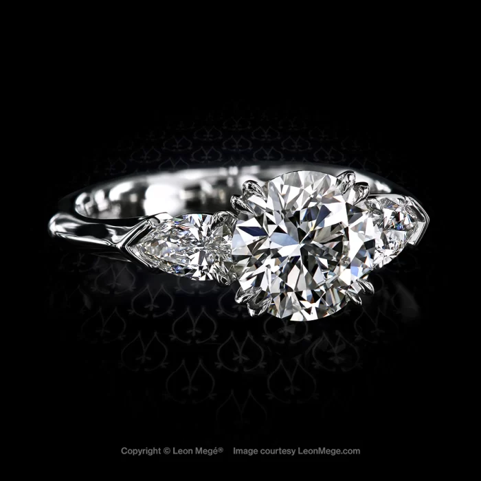 Leon Megé three-stone ring with an ideal-cut diamond and pear-shaped side stones hand-forged in platinum r8096