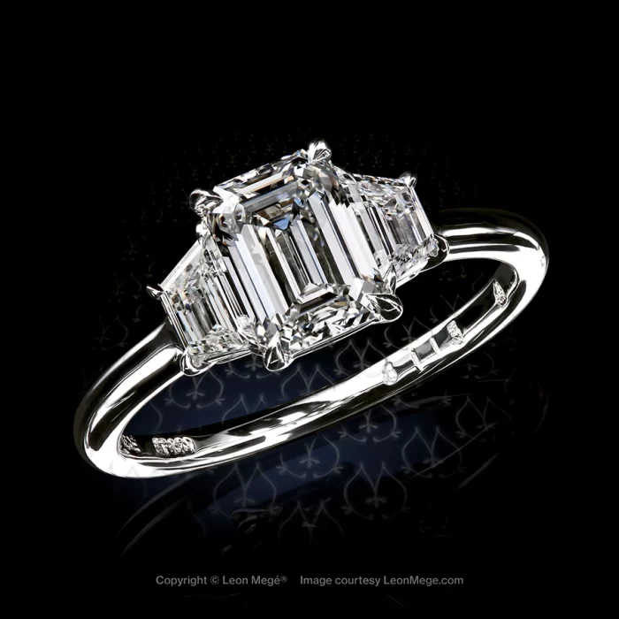 Leon Megé classic three-stone ring with an emerald-cut and trapezoid diamonds r8113