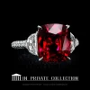 Leon Megé three-stone micro pave ring with a cushion shaped ruby and step-cut diamonds r8169