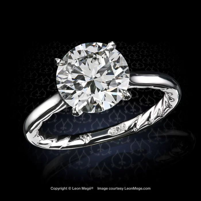 Leon Megé cathedral solitaire with an ideal-cut round diamond in single-claw prongs r8207