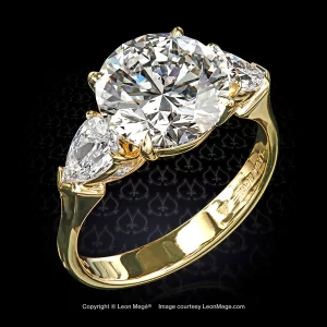 Leon Megé elegant three-stone ring with a round diamond and matching pair of pear-shapes r8469