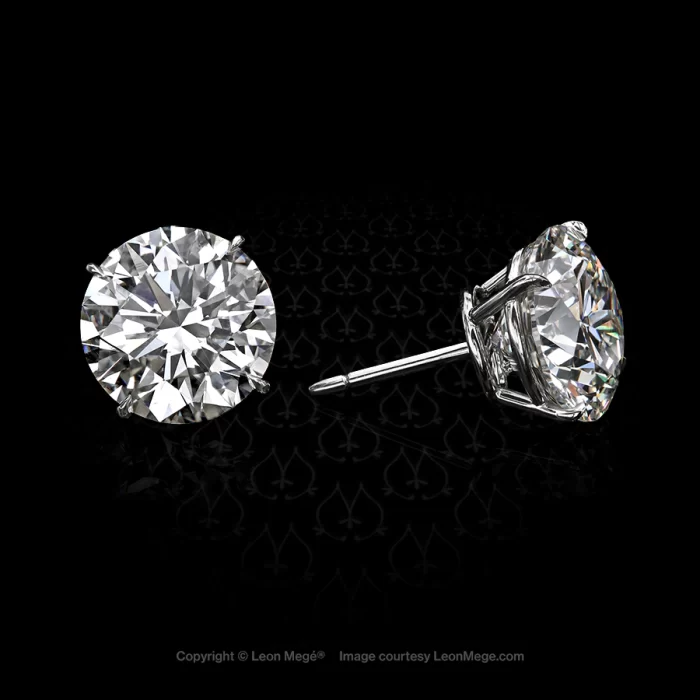 Leon Mege tilted single-prong platinum studs with round diamonds e7851
