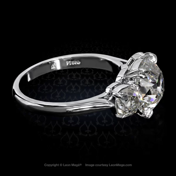 Leon Megé classic three-stone ring with True Antique cushion diamond in a cathedral mounting r5495