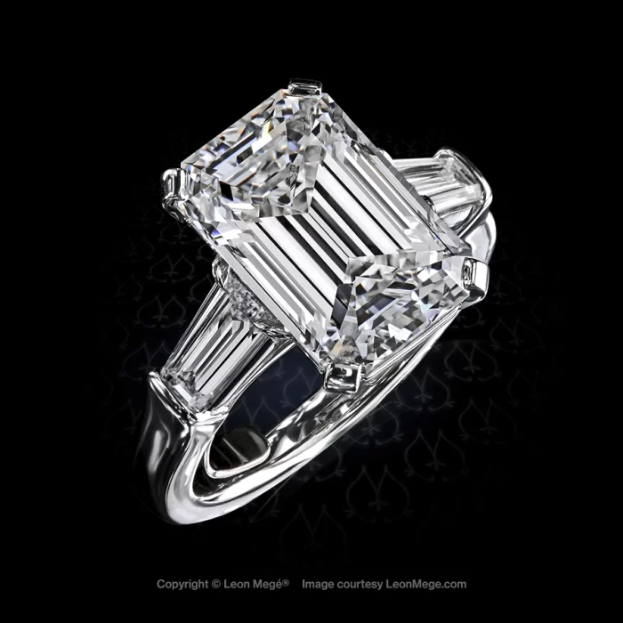 Leon Megé traditional three-stone ring with an emerald cut diamond and tapered baguettes r7756