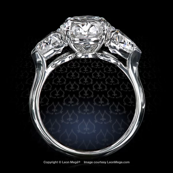 Leon Megé three-stone ring with an oval diamond and a pair of matching heart-shaped diamonds r7826