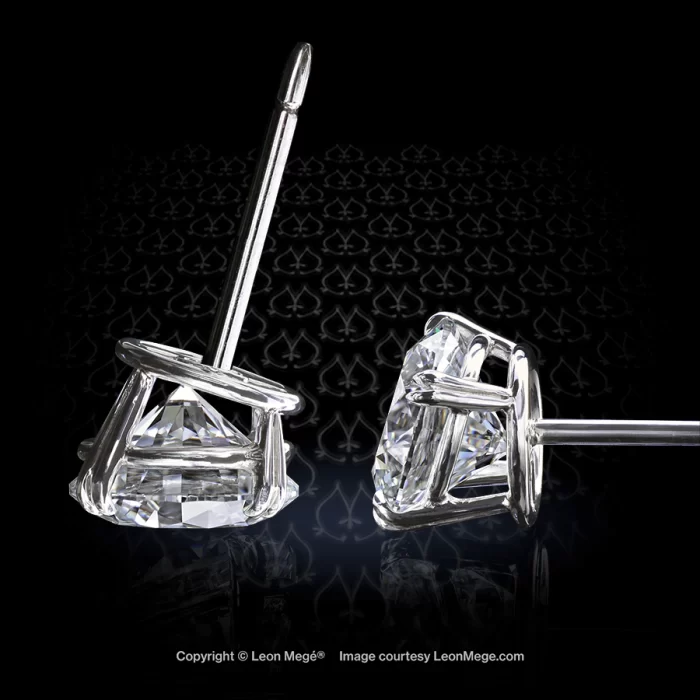 Leon Megé bespoke platinum tilted studs with ideal-cut round diamonds in double claw prongs e7054