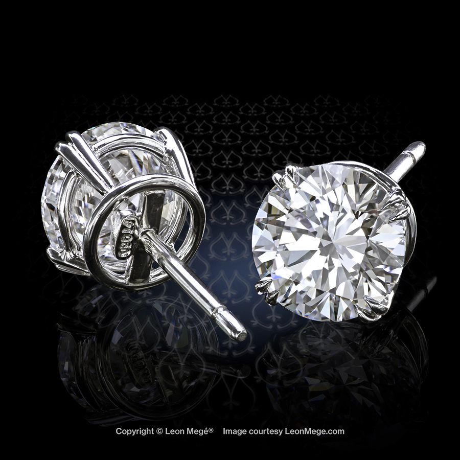 Leon Megé bespoke platinum tilted studs with ideal-cut round diamonds in double claw prongs e7054