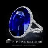 Leon Megé bespoke statement ring with a blue oval Burma sapphire in micro pave halo on a split shank adorned with diamonds r6860