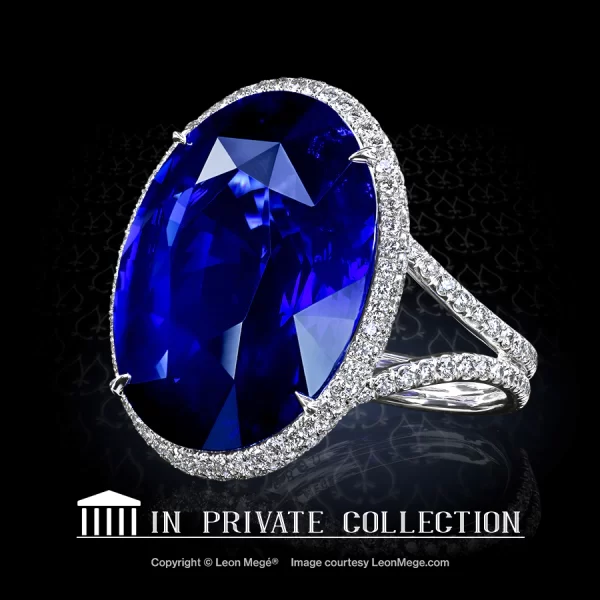 Leon Megé bespoke statement ring with a blue oval Burma sapphire in micro pave halo on a split shank adorned with diamonds r6860