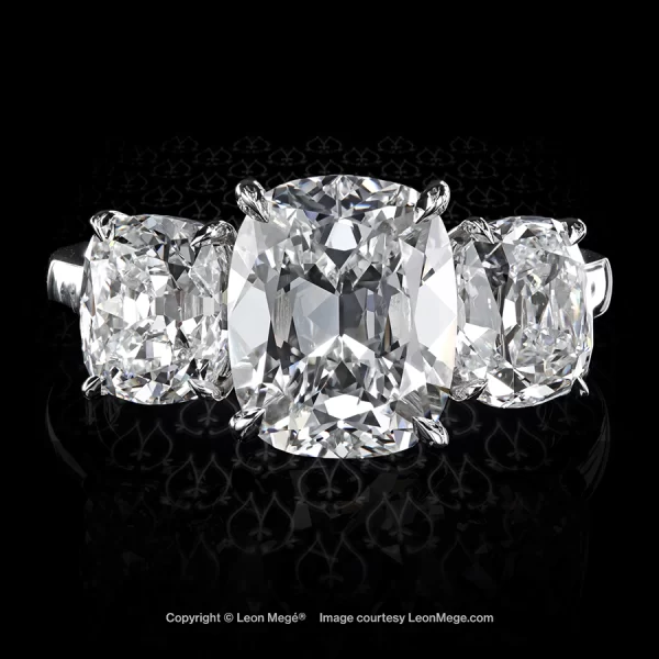Bespoke three-stone ring with True Antique™ cushion diamonds in a hand-made platinum mounting r8571