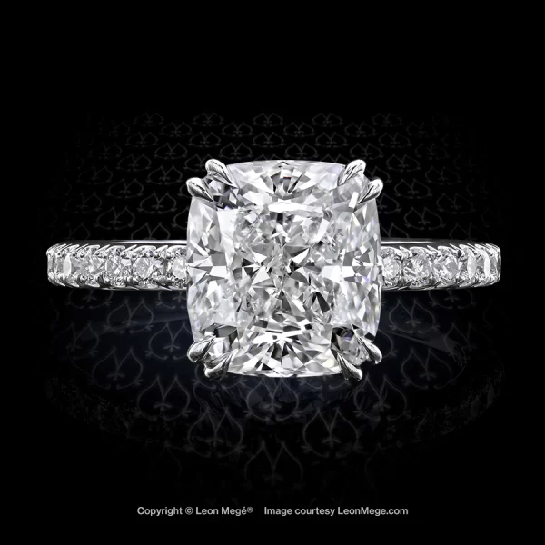 Leon Megé hand-forged platinum solitaire with a modern cushion diamond in double claw prongs r7112