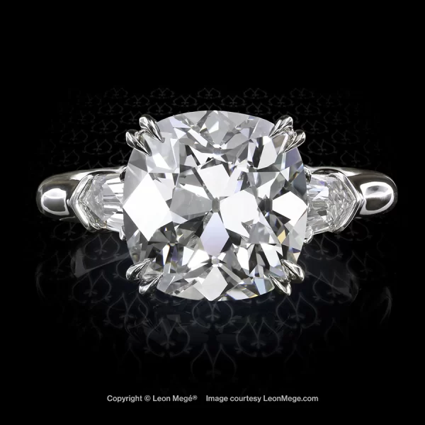 Leon Megé three-stone ring with a True Antique™ cushion diamond and a pair of diamond bullets r7216