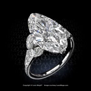 Leon Mege bespoke handmade diamond ring with an antique Moval diamond and marquise side stones r8380