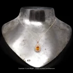 Leon Mege pendant with a rare certified fancy-color Calvados pear-shaped diamond round diamonds and single-cut natural pink diamonds p7809