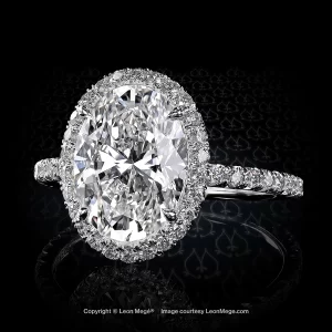 Leon Megé 811-style bespoke engagement ring with an oval micro pave halo surrounding a super brilliant natural oval diamond r8738