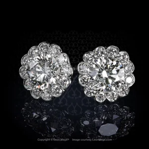 Leon Mege bespoke platinum studs with round diamond center in a circle of semi-bezel-set smaller round diamonds e8848