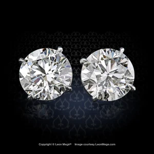 Leon Mege platinum studs with a round diamond in single prongs in a basket setting round wire e8704